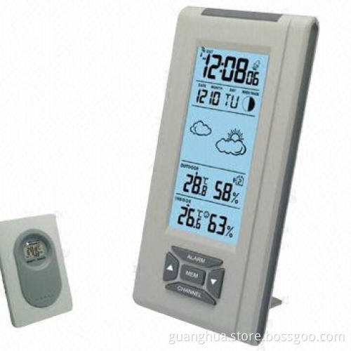 Radio controlled alarm novelty clock, indoor and outdoor temperature and humidity display